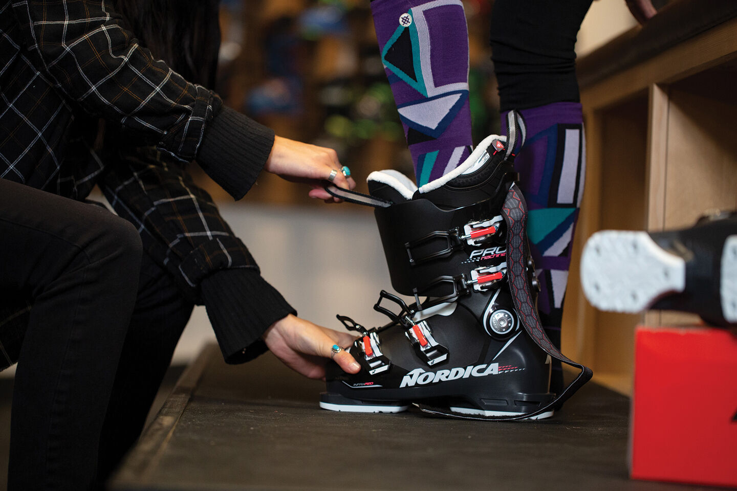 Person getting ski boots fit
